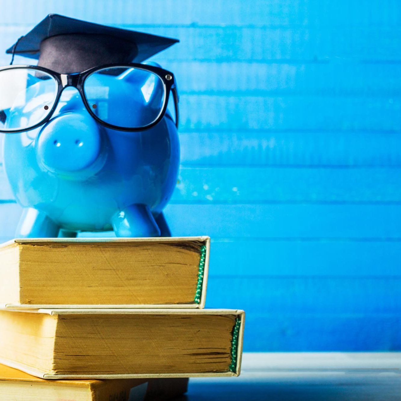 college-graduate-student-diploma-piggy-bank